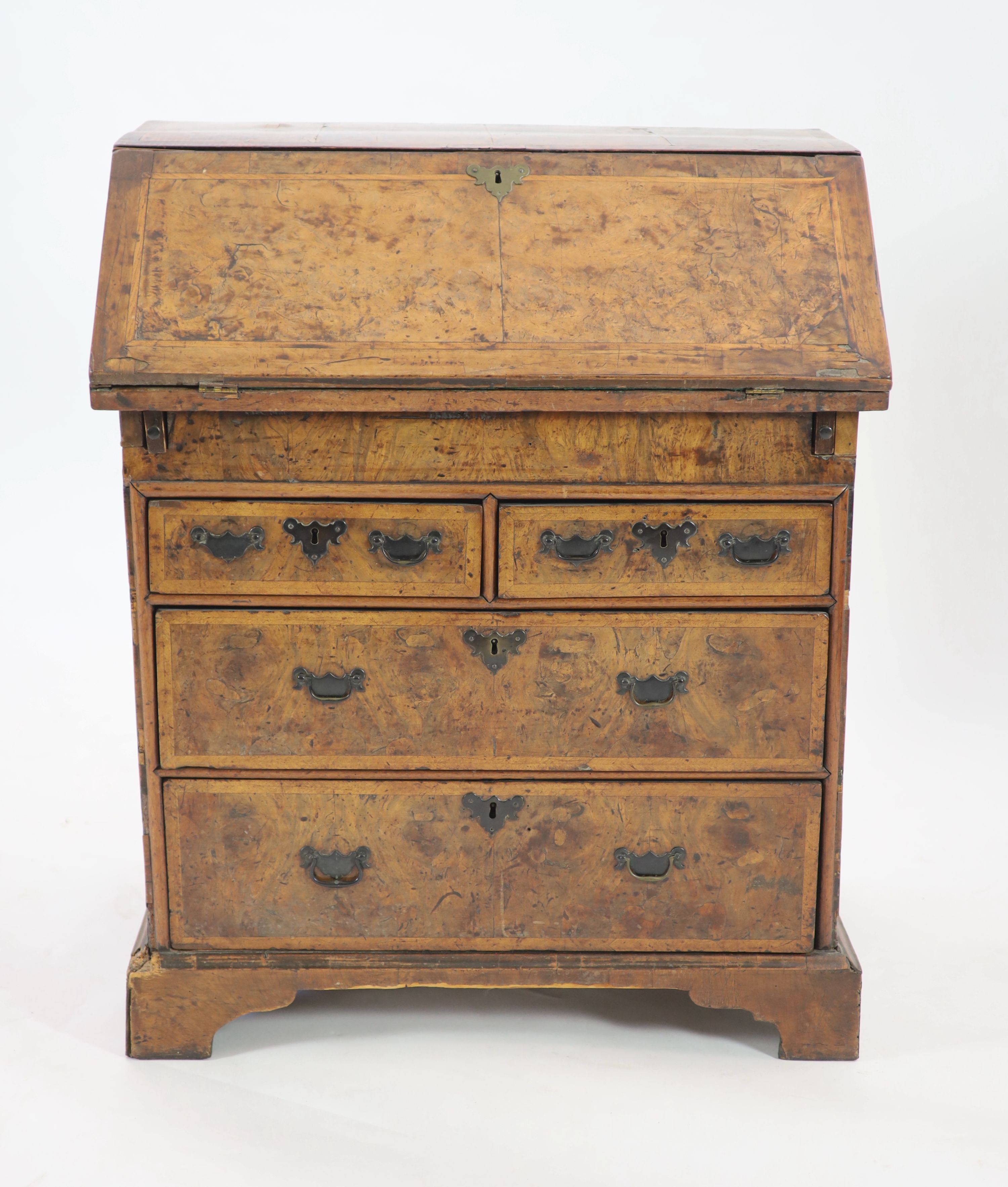 A Queen Anne crossbanded walnut bureau, W.81cm D.82cm H.98cm